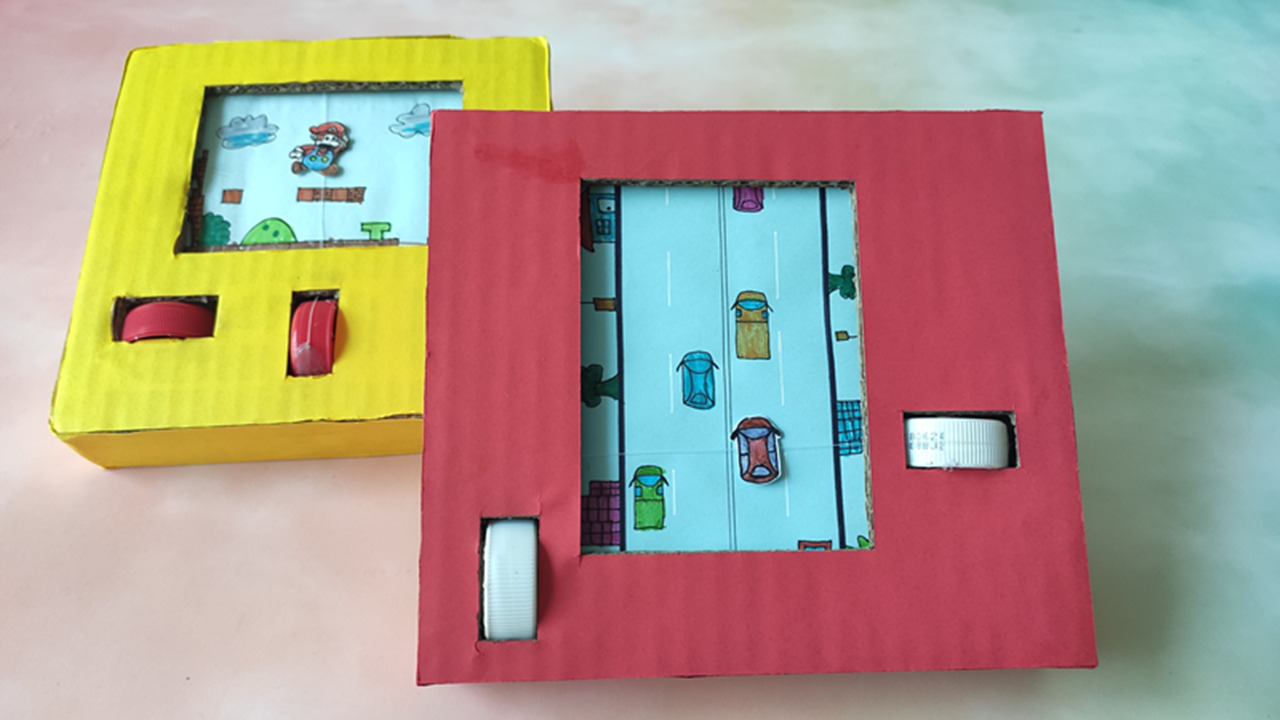 如何用纸板制作手机可以玩_怎么用纸板做好玩的游戏_纸板手机制作游戏机图片